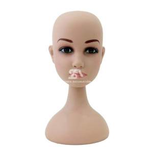 Foto de producto cabeza desmontable infantil de plástico con rostro pintado y base en color carne