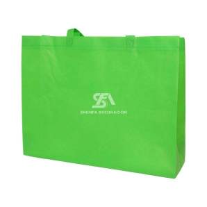 Foto de bolsa gigante de NW con fuelle color verde