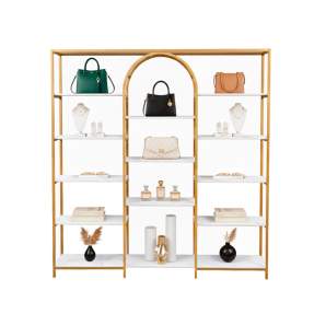 Uso estantería metálica decorativa moderna dorada estilo boutique